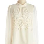 a lacy white victorian blouse.